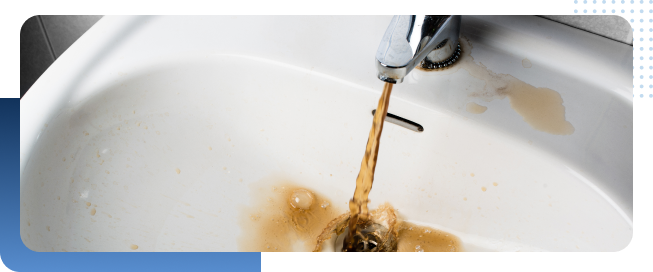 Iron creating brown rusting water coming from sink
